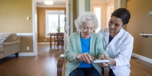 Occupational therapist and senior on home safety assessment