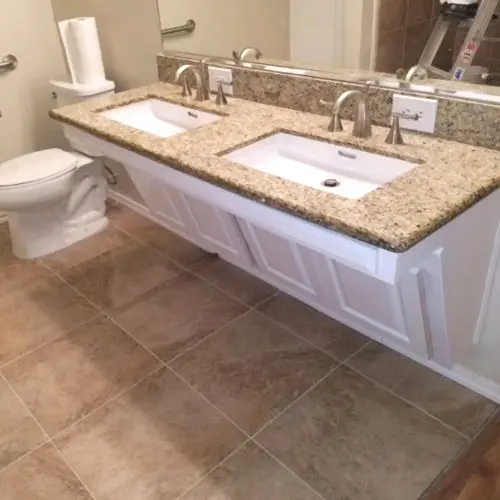 Roll under bathroom sinks for wheelchair usage.